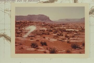 Down Grand Canyon from near Mt. Sinyala. Yumtheska Point at upper left. Snow on Mt. Emma in distance