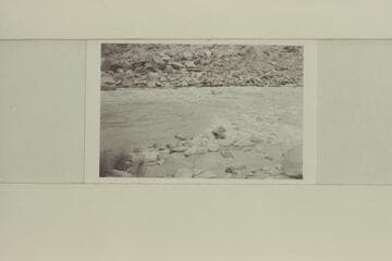 13-Foot Rapid, mouth of Cha Canyon, Mile 11. Nevills in boat riding through rapid alone