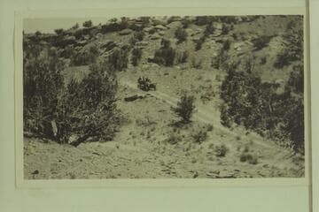 Chain Drive Stearns; first auto of Charles H. Spencer. Bwtween Gallup and Fort Defiance. Tires $550.00; $110.00 each. Carried 9# of air. C.H.S. Spencer took this auto from Gallup to Oljato in 1909