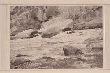 A. K. Reynolds running the lower end of Triplet Rapid. Low water