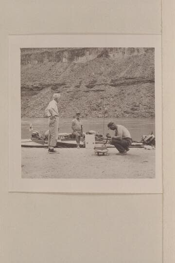 Attempting radio communication with stations on the Rim. Mile 210 camp. Desloge; Ballard Atherton; Wallis