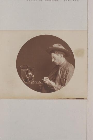 Raymond Austin Cogswell. "Picture with the camera was in summer of 1909 just before starting on the trip. Made in Elyria." (letter of Cogswell, 1955, Dec.)