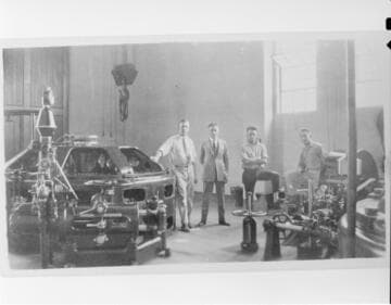 The operating crew standing in the interior of the City of Los Angeles # ? Hydro Plant near Saugus using water from the Owens River Aqueduct