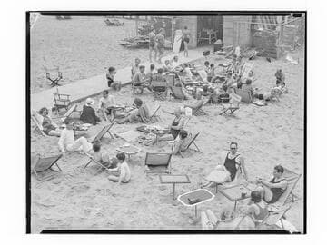 People sitting outdoors at Deauville Club, Santa Monica