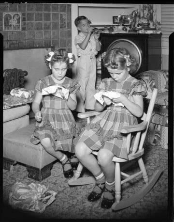 Two little girls and a boy working on Christmas decorations and embroidery with 3 variants