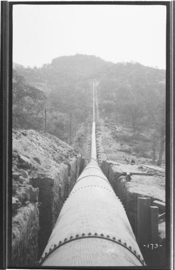 A long view of the pressure pipe at Kaweah #3 Hydro Plant before backfilling