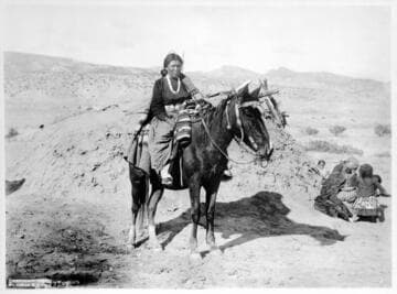 Navajo woman on horse