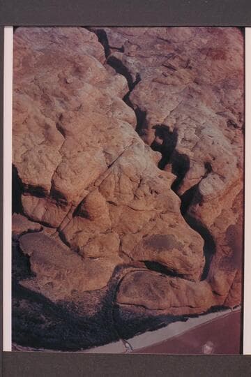 Tributary to Glen Canyon at Mile 63.9; right bank. Approximate gauge: 31,000 cfs