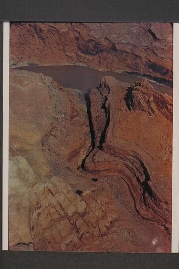 Northwest to Glen Canyon at Mile 101.7. Approximate gauge: 23,000 cfs