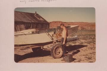 Pat Reilly repairing the San Juan punt "Hidden Passage" at Mexican Hat