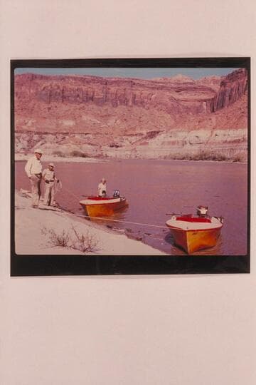 The Harris-Brennan motor-boats in Glen Canyon. Brennan is at left and Harris is next to him; below Trachyte Rapid