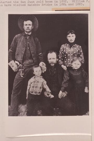 Family of Jonathan Paul Williams. William Franklyn Williams is standing. Jonathan P. Williams is reported to have been the one who started the San Juan gold boom in 1892. William F. claims to have visited Rainbow Bridge in 1884 and 1885