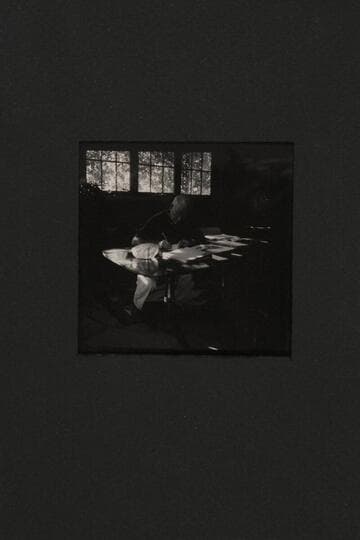 Dock Marston writes the notes of the trip near Navajo Mountain; dining room of Navajo Mountain Trading Post