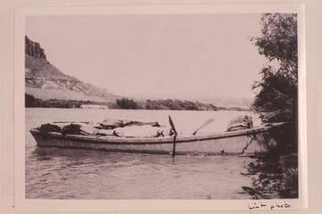 Skiff used on San Juan survey of 1921. Lint was with the party which surveyed Cataract Canyon and met the San Juan party near the mouth of the San Juan. Possibly used in the LaRue junket in Glen Canyon in 1922