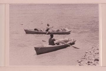 Start of San Juan survey 6 miles west of Bluff. The boatman in the distance is Bert Loper