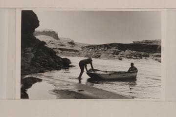 Reynolds' aluminum boat; confluence of San Juan and Colorado Rivers. Bill Chenowith (AEC) and Jack Frost, Jr