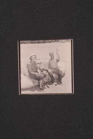 Fern and Bill Davis in the 7-man inflated boat in which they have traveled from Green River, Wyoming, to Bright Angel Creek. At Paria Riffle