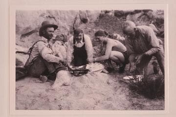Assembling boats and camp. Hite. Second from left is Loper. Third from left is Sarah Fraser. Fourth from left is Dave Rust??