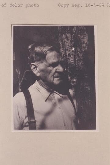 Bert Loper at the door of the Hermitage at Red Canyon