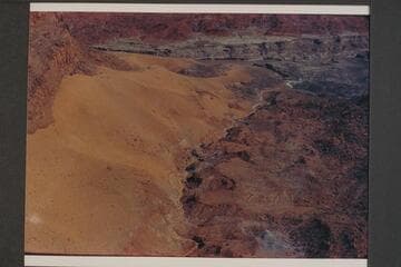 North to mouth of wash at side of The Rincon. Mile 99.3. Approximate gauge: 31,000